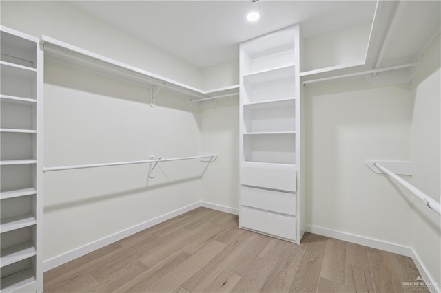 403 Faith Dr, La Feria, TX 78559 - walk in closet with wood finished floors