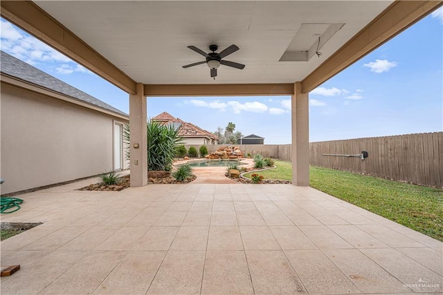 view of patio featuring ceiling fan