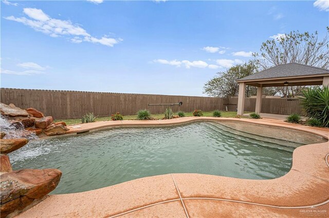 view of pool featuring a gazebo and a patio area