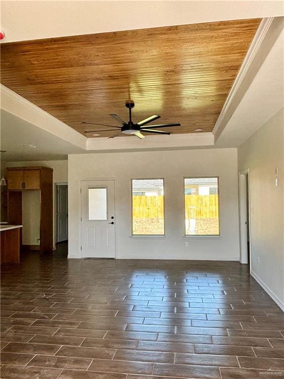 1804 Hailey St, San Juan, TX 78589 - unfurnished living room featuring a ceiling fan, wood tiled floor, wooden ceiling, and a raised ceiling