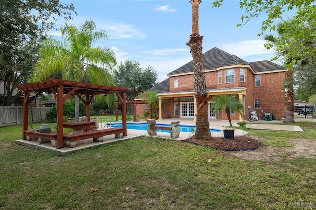 exterior space featuring a pergola, a fenced in pool, and a lawn