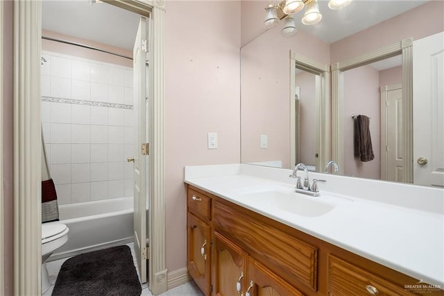 full bathroom featuring shower / bathtub combination with curtain, vanity, and toilet