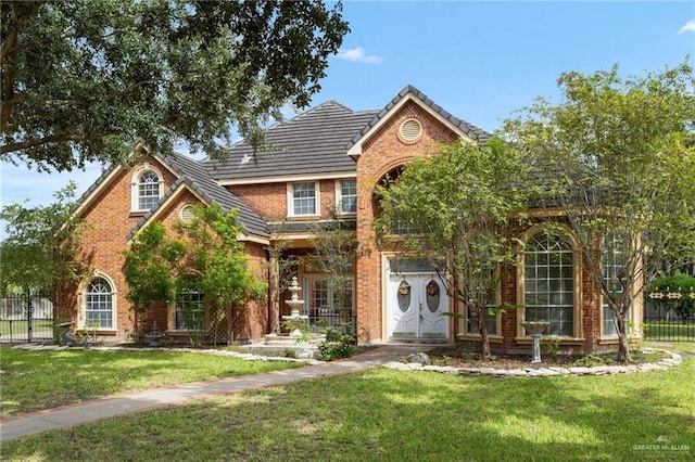 view of front of property with a front lawn