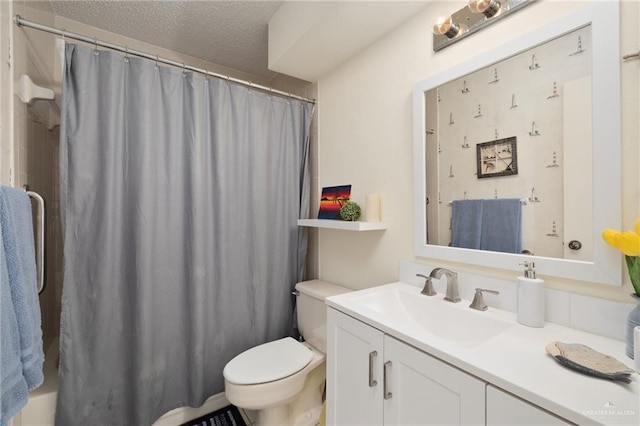 full bath featuring a textured ceiling, curtained shower, vanity, and toilet