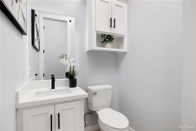 3306 Lauren Dr, Palmview, TX 78574 - half bath with vanity, toilet, and baseboards
