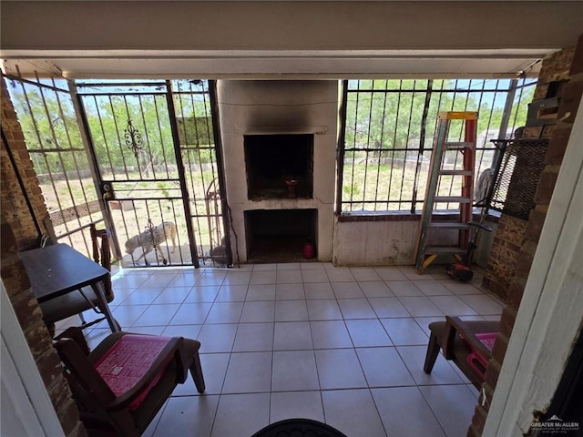 living room featuring tile patterned floors and plenty of natural light