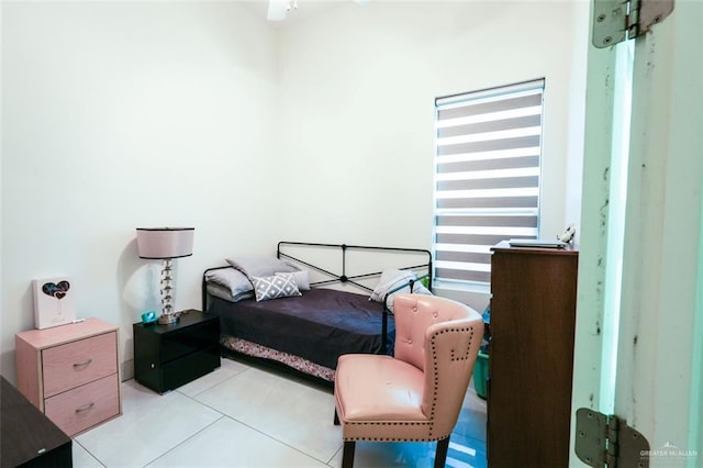 bedroom featuring light tile patterned floors