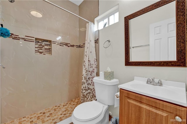 22613 N Sunflower Rd, Monte Alto, TX 78538 - full bath with toilet, tiled shower, and vanity