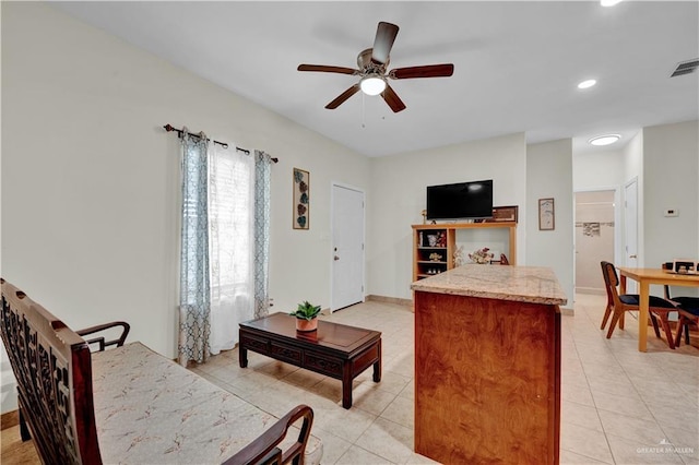 22613 N Sunflower Rd, Monte Alto, TX 78538 - living area with light tile patterned floors, ceiling fan, and recessed lighting