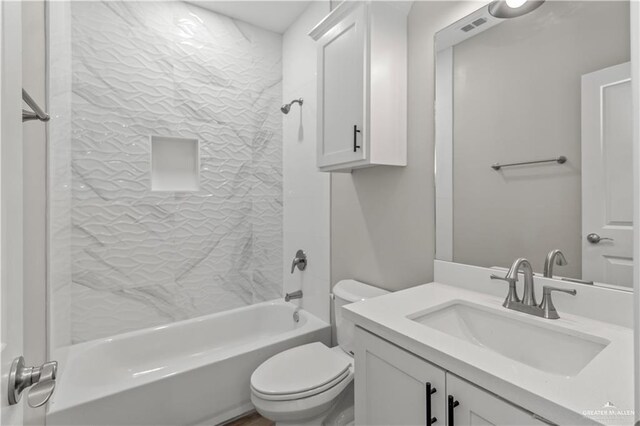 full bathroom with vanity, toilet, and shower / washtub combination