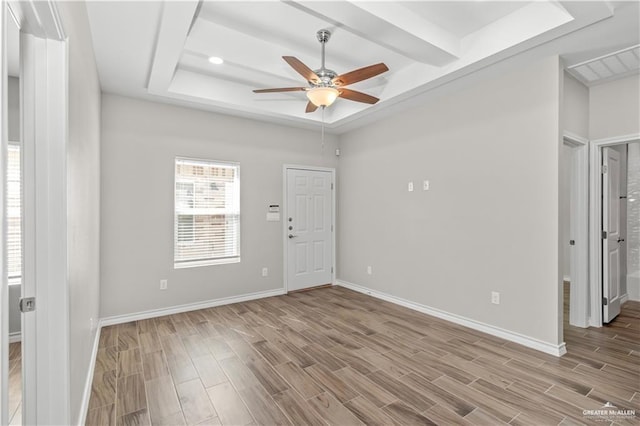 spare room featuring ceiling fan and light hardwood / wood-style floors