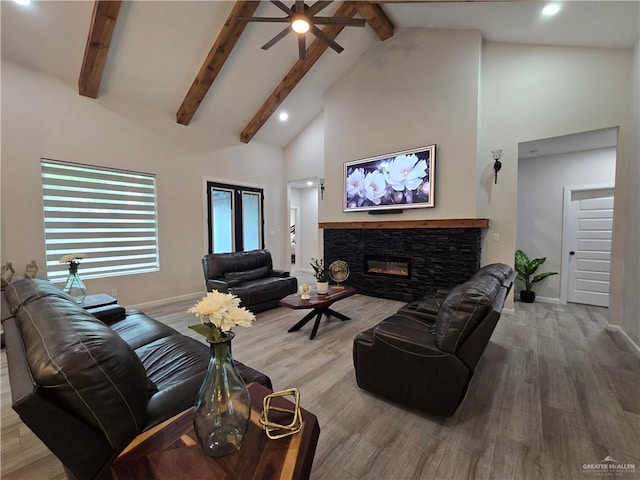 7313 N 25th Ln, Mcallen, TX 78504 - living area featuring a ceiling fan, beam ceiling, wood finished floors, high vaulted ceiling, and baseboards