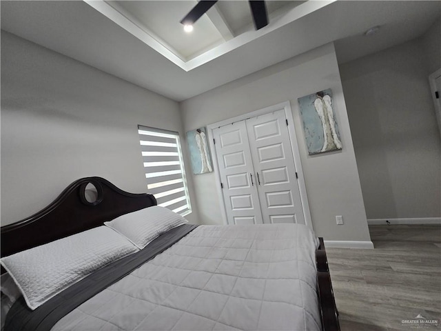7313 N 25th Ln, Mcallen, TX 78504 - bedroom featuring baseboards, a closet, and wood finished floors