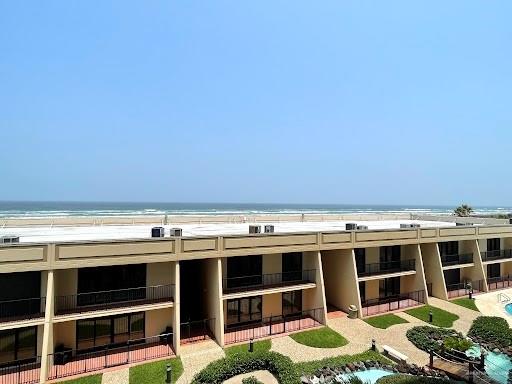 property view of water featuring a beach view