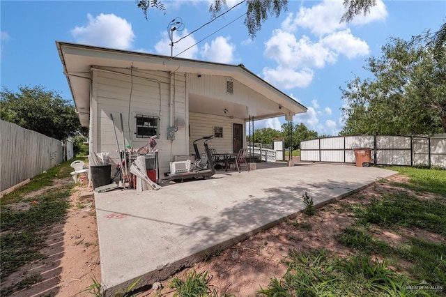 421 W Champion St, Edinburg, TX 78539 - rear view of house with a patio and a carport
