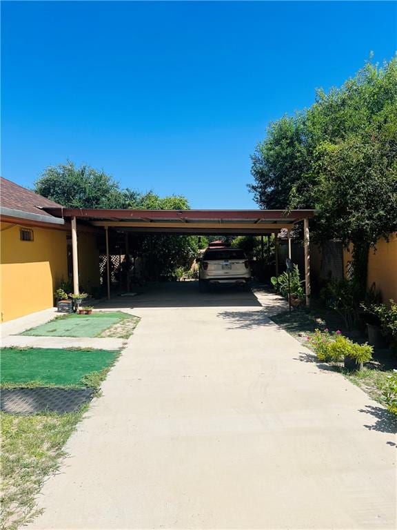 view of car parking with a carport