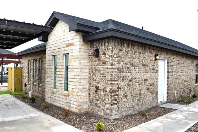 2904 E Israel Ave, Alton, TX 78573 - view of side of home with brick siding and roof with shingles