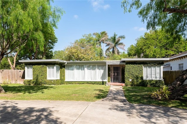 1821 Palm Blvd, Brownsville, TX 78520 - mid-century inspired home featuring board and batten siding