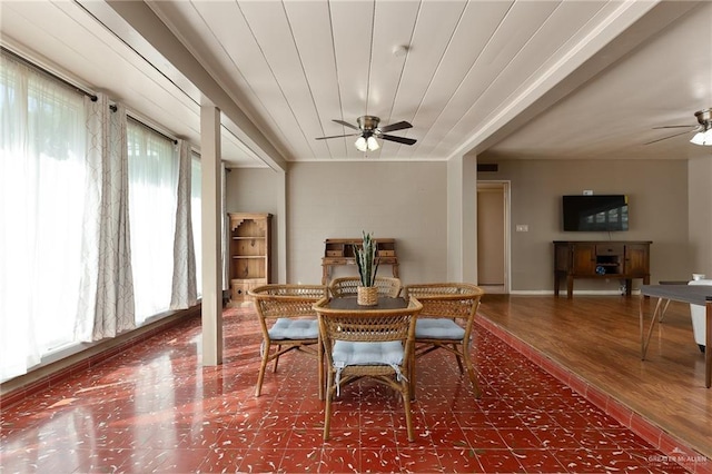 1821 Palm Blvd, Brownsville, TX 78520 - dining room featuring ceiling fan, plenty of natural light, wood finished floors, and baseboards