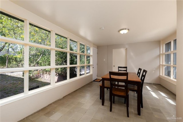 1821 Palm Blvd, Brownsville, TX 78520 - dining space with light tile patterned floors
