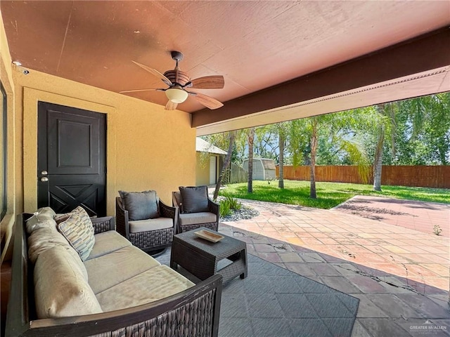 view of patio with an outdoor hangout area and ceiling fan