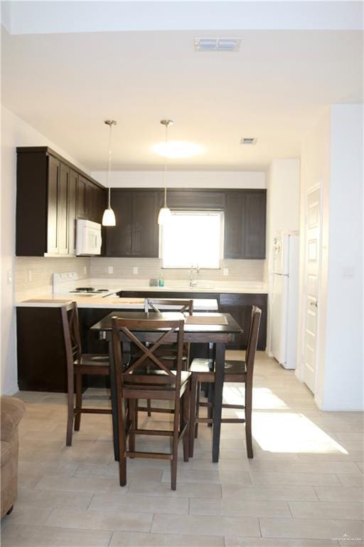 dining room featuring sink