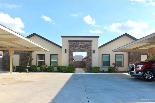 view of front of property with a carport