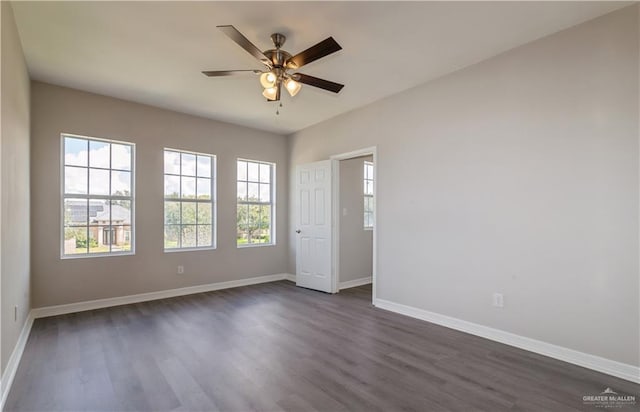 27406 S Kelly Ct, La Feria, TX 78559 - empty room featuring dark wood-style floors and ceiling fan
