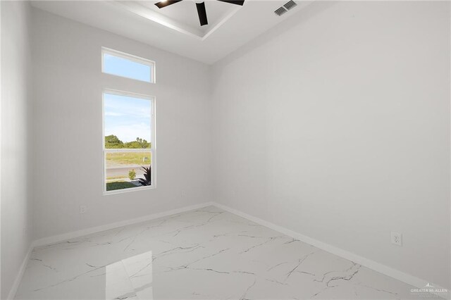 spare room featuring ceiling fan