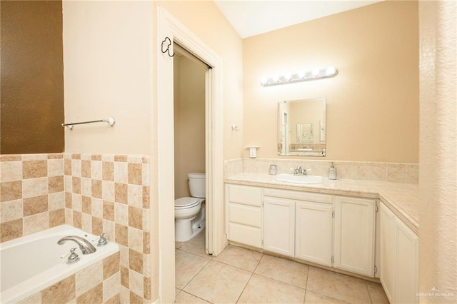 24162 N Tamm Ln, Harlingen, TX 78552 - full bath with toilet, vanity, a bath, and tile patterned floors