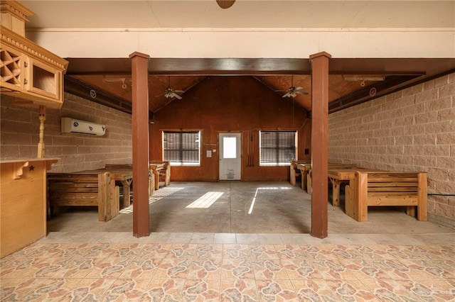24162 N Tamm Ln, Harlingen, TX 78552 - unfurnished living room with vaulted ceiling, a ceiling fan, and decorative columns