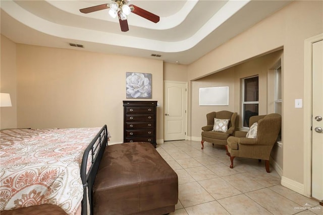 24162 N Tamm Ln, Harlingen, TX 78552 - bedroom with light tile patterned floors, ceiling fan, and baseboards