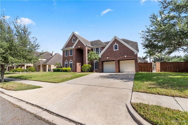 front of property featuring a garage and a front yard