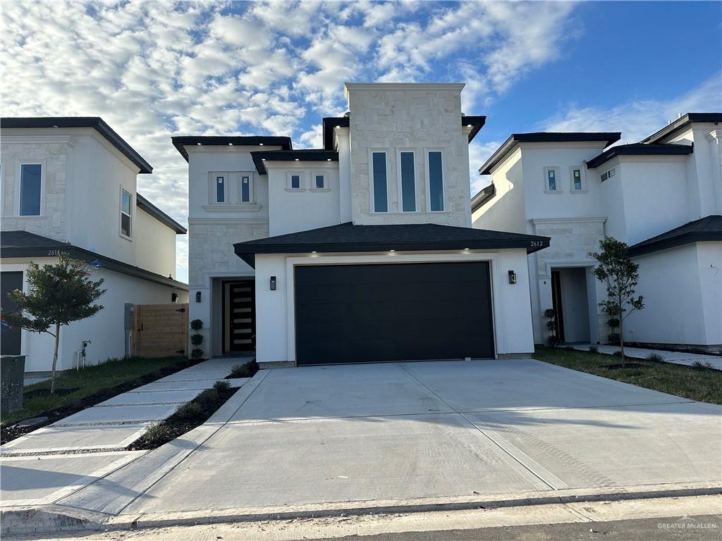 view of front of property featuring a garage