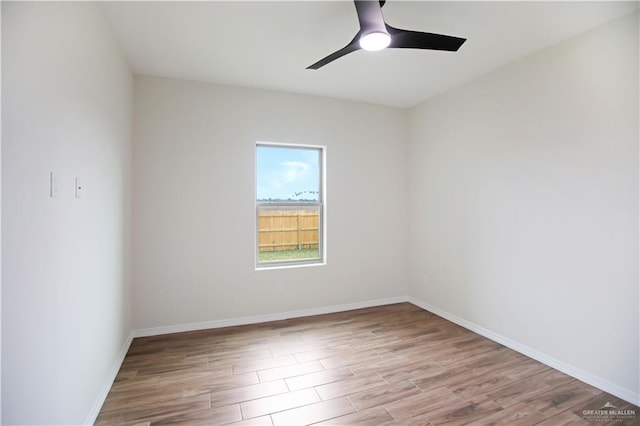 unfurnished room featuring ceiling fan and light hardwood / wood-style floors