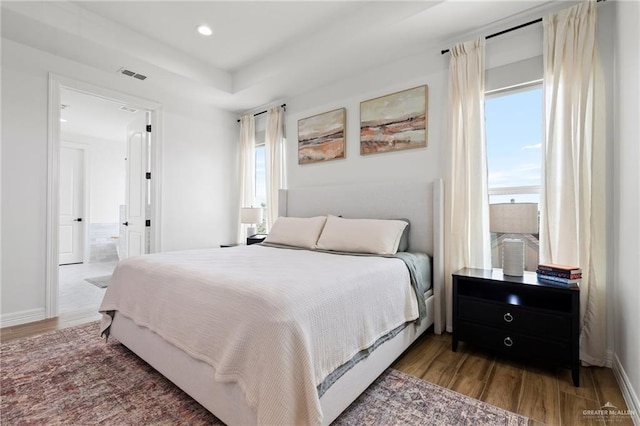 1405 Jocelyn Cir, Harlingen, TX 78552 - bedroom with recessed lighting, visible vents, wood finished floors, and baseboards