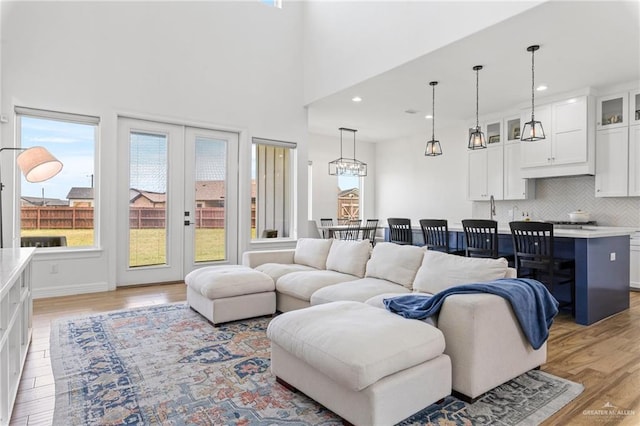 1405 Jocelyn Cir, Harlingen, TX 78552 - living room with recessed lighting and light wood-style flooring