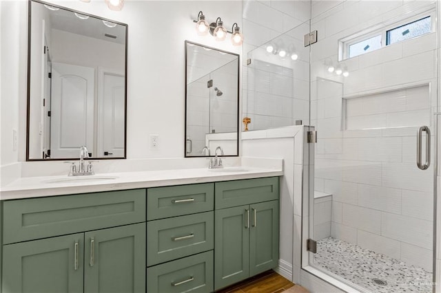 1405 Jocelyn Cir, Harlingen, TX 78552 - bathroom featuring double vanity, a sink, and a shower stall