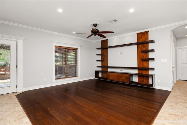 unfurnished living room featuring ceiling fan, ornamental molding, and hardwood / wood-style floors