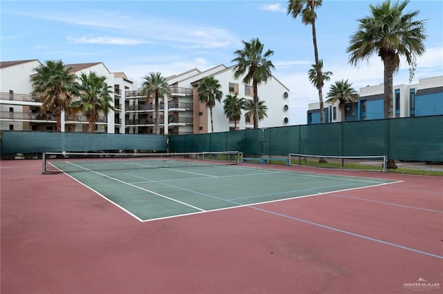 view of tennis court featuring basketball court