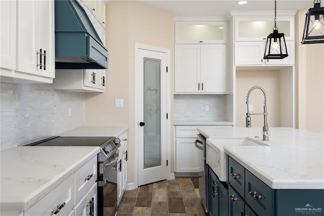 kitchen with appliances with stainless steel finishes and white cabinets