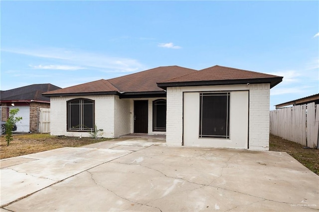 rear view of house featuring a patio