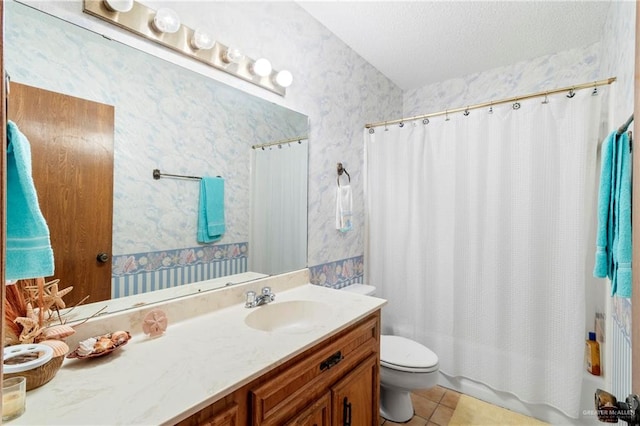 full bathroom featuring shower / bath combo, tile patterned flooring, vanity, a textured ceiling, and toilet