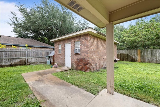 2706 E 28th St, Mission, TX 78574 - view of yard featuring an outbuilding, a patio area, and cooling unit