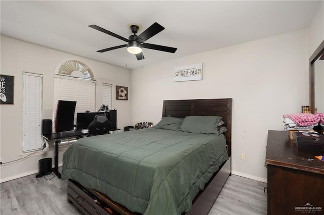 3500 Santa Lucia Cir, Mission, TX 78572 - bedroom with wood finished floors, baseboards, and a ceiling fan