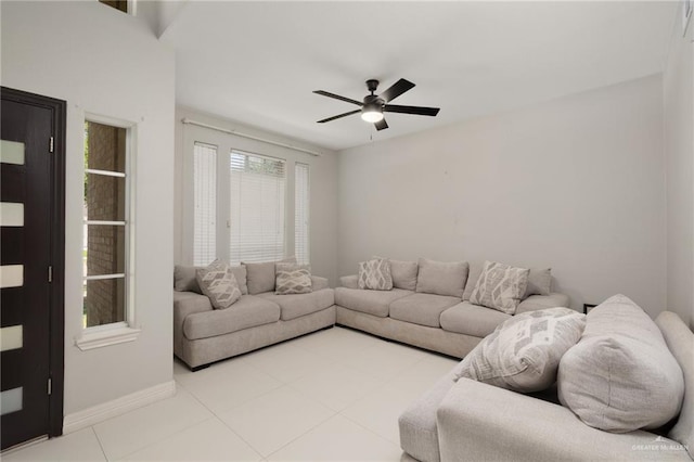 3500 Santa Lucia Cir, Mission, TX 78572 - living room featuring ceiling fan, light tile patterned floors, and baseboards