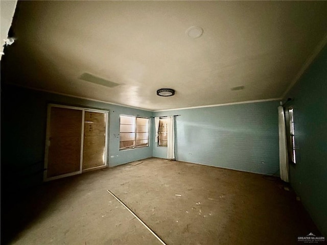 unfurnished bedroom with ornamental molding