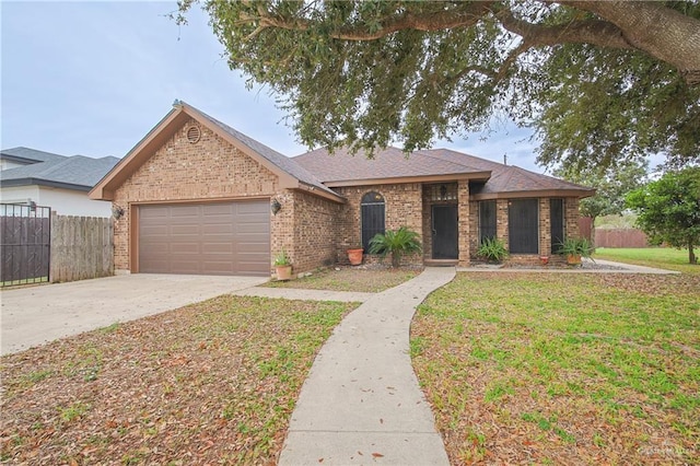 ranch-style house with a front lawn and a garage