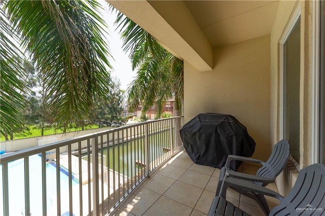 5909 Padre Blvd Unit 201, South Padre Island, TX 78597 - balcony with view of pool and grilling area