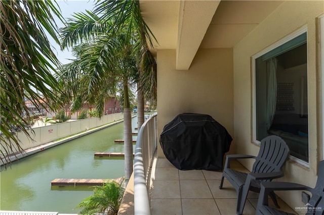 5909 Padre Blvd Unit 201, South Padre Island, TX 78597 - balcony featuring a water view and area for grilling